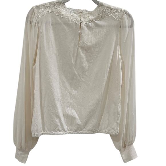 Anthropologie Tiny Long-Sleeve
Mock-Neck Lace Embellished Top - Picture 9 of 9